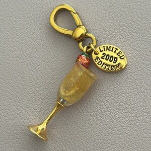 Juicy Couture champagne charm